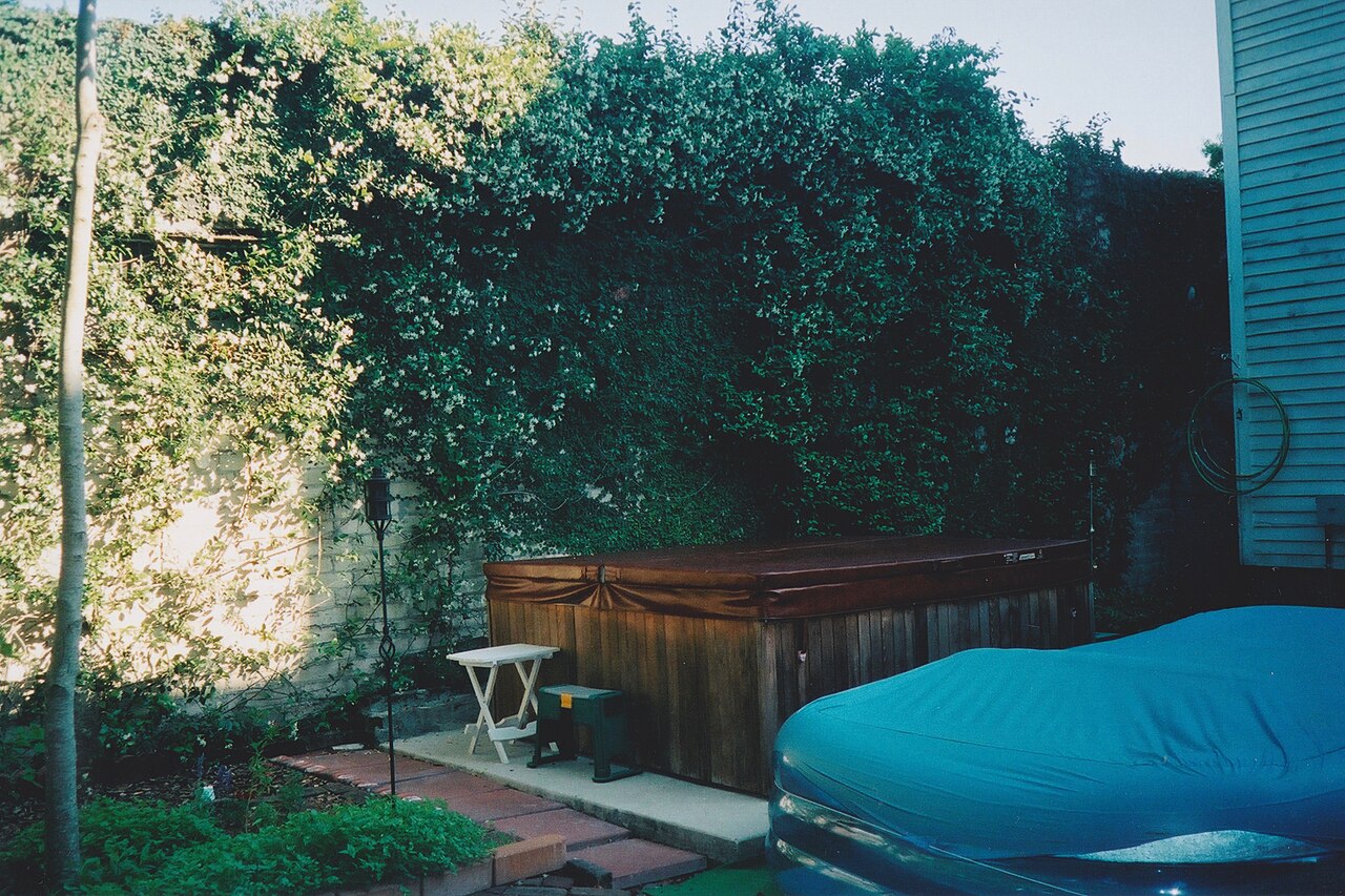A backyard hot tub on a deck